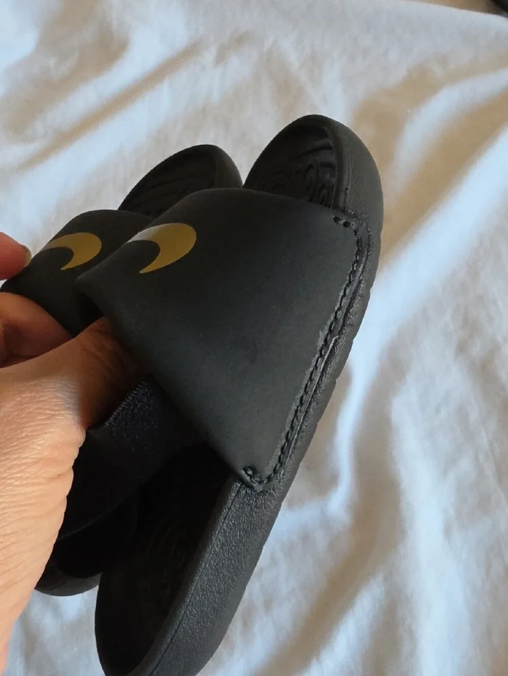 Nike Toddler Black Slide Sandals with Gold Swoosh